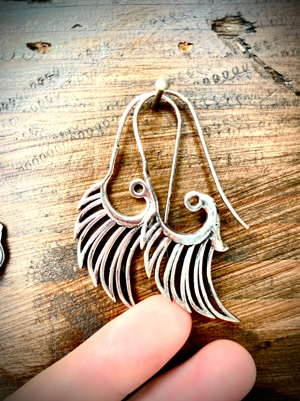 Boucles d'oreilles argents, motif ailé